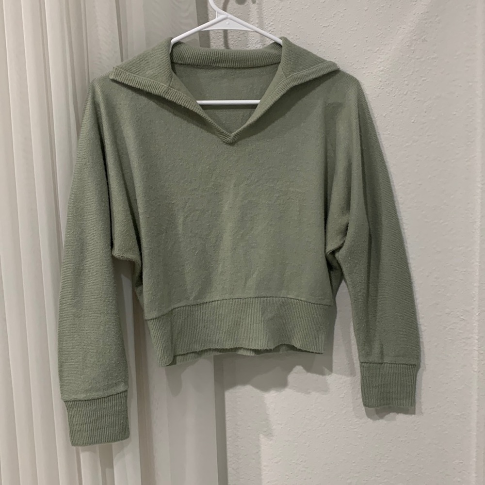 Pale green light sweater
